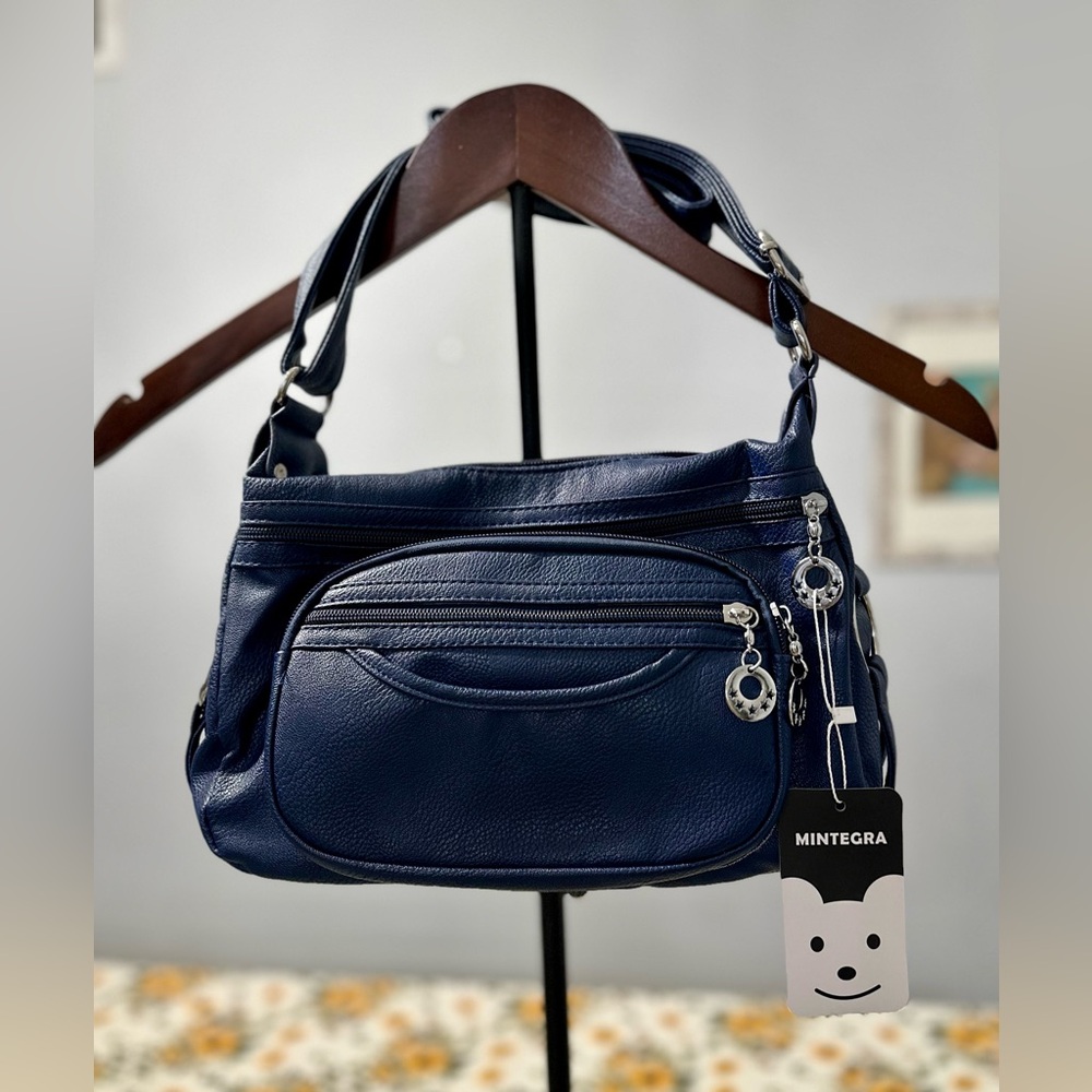 Blue and Silver Shoulder Bag with Curved Strap and Hobo Shape